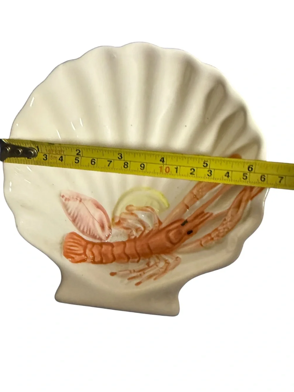 vintage Bassano ceramic lobster dish shaped like a scalloped seashell, featuring